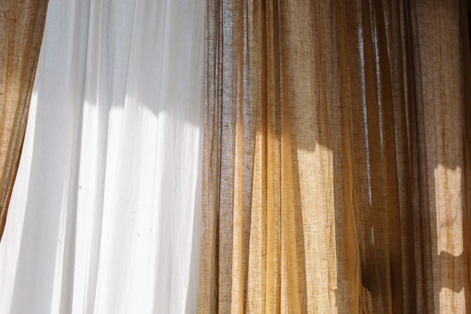Modern roller shades drawn in a contemporary living space